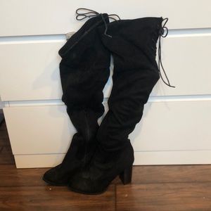 Thigh-high black boots